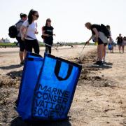 Optical Express and Marine Society volunteers attempt Troon beach clean up