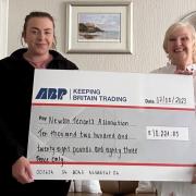 ABP’s Jenna Croasdale (left) donating a cheque of £10,228.83 to Helen Russell Newton (right) of Newton Tenant’s Association