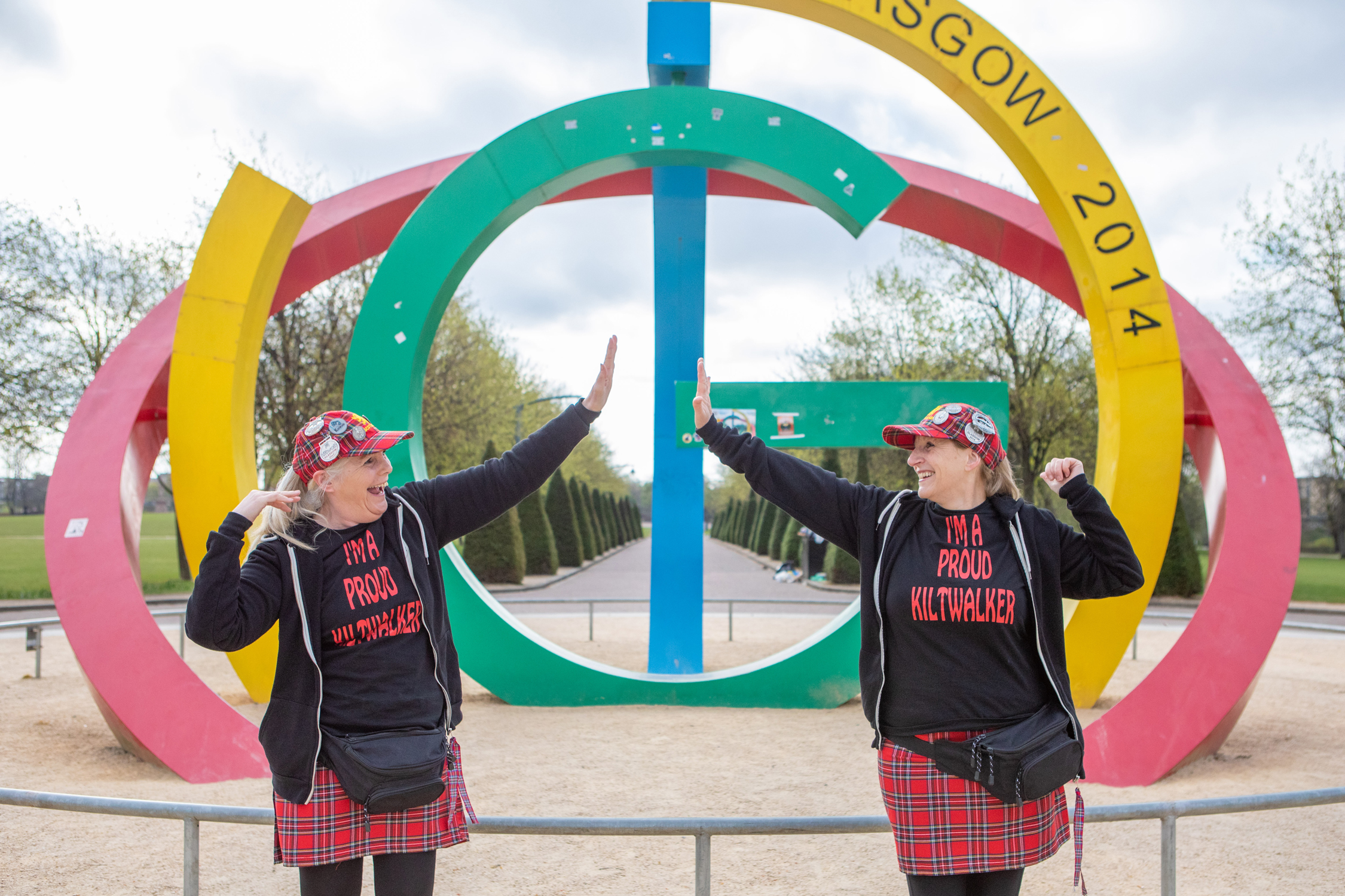 Virtual Kiltwalk 23-25 April, 2021 L-R Jacqueline Wilson and Irene Brown from Glasgow warm up before they begin their 26 mile Virtual Kiltwalk at Glasgow Green