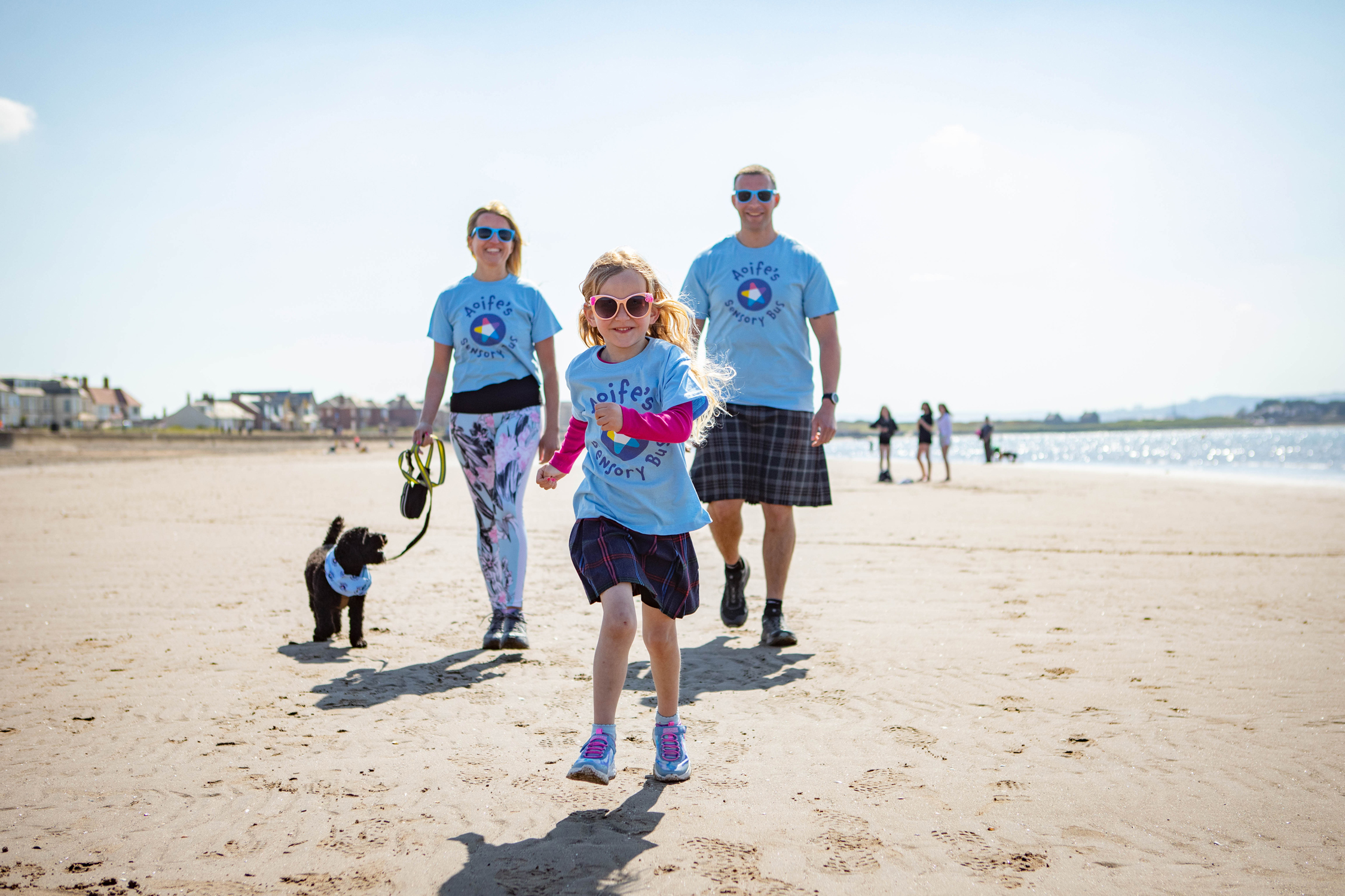 Trustees for the charity Aoife’s Sensory Bus, Michael Kidd and wife Evelyn and daughter Eilidh, five, and their dog Cora from Ayrshire walking the perimeter of Ayrshire including Arran to raise funds for the charity. Photographed on Prestwick
