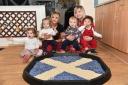 Rainbow Nursery Burns Suppers.St Andrews flag made out of Porridge oats.