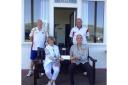 Girvan Bowling Club handed over the kind donation.