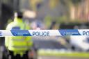 Cops lock down Glasgow road due an ongoing incident