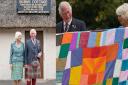 In Pictures: Charles and Camilla unfurl giant knitted patchwork at Dumfries House