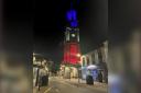 The Wallace Tower in red, white and blue for the Queen