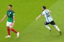 Lionel Messi, right, celebrates his crucial goal against Mexico