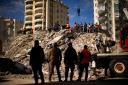 Search teams and emergency aid from around the world poured into Turkey and Syria on Tuesday following a magnitude 7.8 earthquake on Monday, February 6. (AP Photo/Francisco Seco)