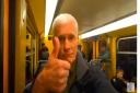 Scott pictured on the Brussels Metro as his train arrives at Troon station