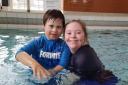 Cerys (right), Learn to swim teacher with Sport and Leisure
