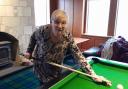 Linda is back at the pool table after her op