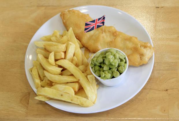 Ayr Advertiser: Fish, chips and mushy peas. Credit: PA