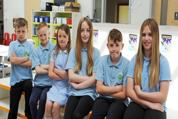 Queen Errin Mullen ,11, P7, King Jack Dempster, 11, P7, Lady in waiting Skye Shaw, 10, P6, Junior lady in waiting Lexi Beck, 8, P4, Page boy Harry Nohar, 10, P6 and junior page boy Charlie Bradford, 9, P5. Muirkirk primary school.
