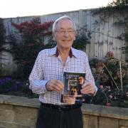 Vet and Honest Man Graham Watson with a copy of his new book