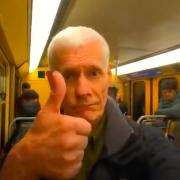 Scott pictured on the Brussels Metro as his train arrives at Troon station