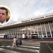 Douglas Ross, inset, paid a visit to a business at Prestwick Airport on Thursday