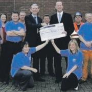 Workers at Ayr’s port helped raise a massive £250,000 during a nationwide tandem cycle relay.