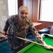 Linda is back at the pool table after her op
