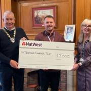Provost Campbell handed over the cheque