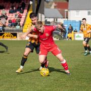 Auchinleck Talbot and Beith remain in contention for the Premier Division title after a 1-1 draw at Beechwood Park on Saturday