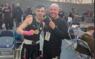 Ayr Boxing Club coach Allan Bell (right) with member Gordon Ward, who won gold at the Scottish Novice Championships at the Ravenscraig Regional Sports Centre in Lanarkshire